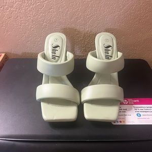 24. Mint green heels